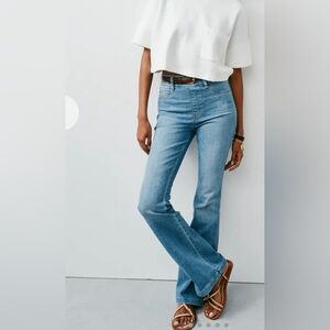 SPANX Light Blue Flare Jeans. size small/regular length